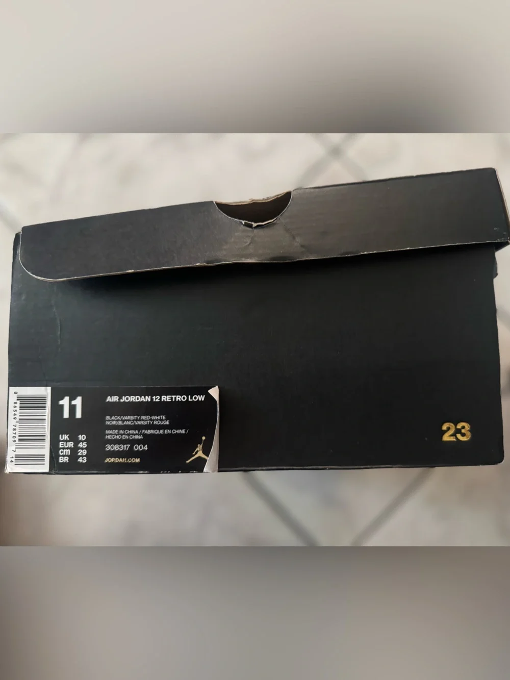 Jordan Men's Retro 12 Low-Top Sneakers in Black and White